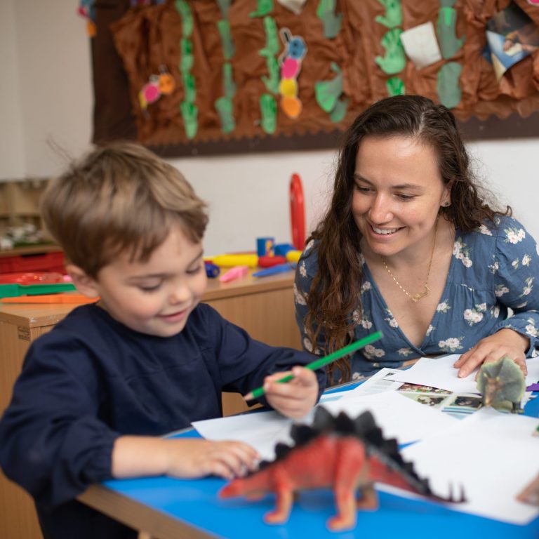 boy learning with teacher