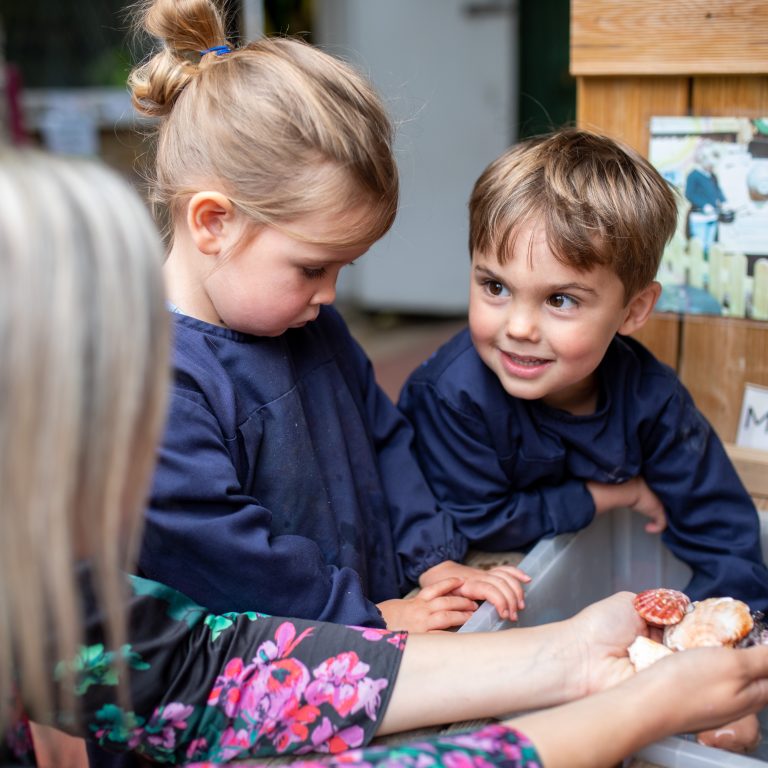 children playing with shells