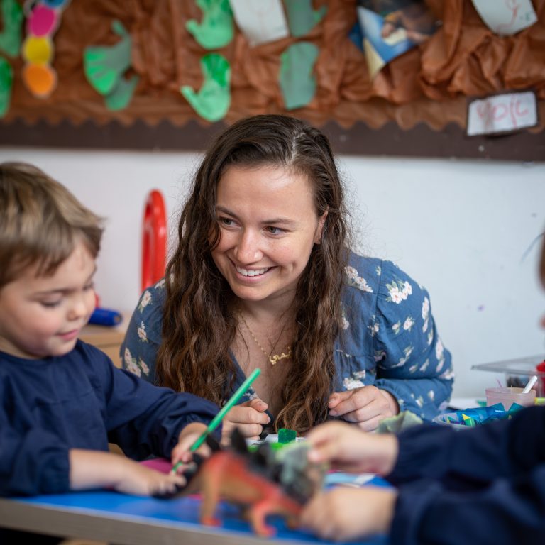 teacher and child colouring