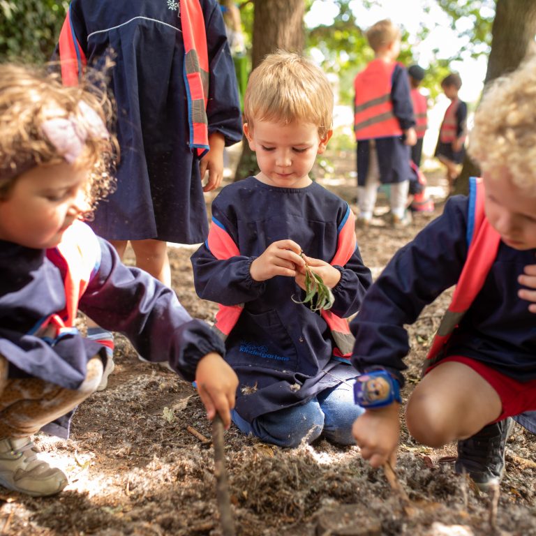 children playing with branches