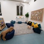 play area with bean bags and plush toys