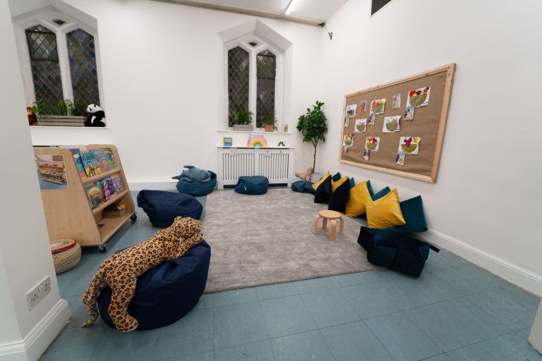 play area with bean bags and plush toys