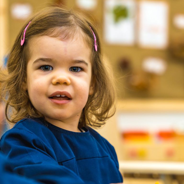 Girl with pink clips in her hair